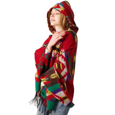 China Bohemian Vintage Striped Striped Pashmina Horn Button Geometric Winter Knitting Ponchos With Hat For Woman for sale