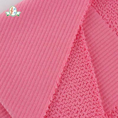 China High Quality Pink Bubble Fabric Simple Stretch Tank Top Knitted Fabric 79% Polyester For Swimwear for sale