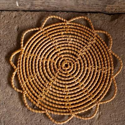 China Sustainable Rattan Hand Woven Placemats Round Placemats Hand Made Entirely Natural Rattan Pure Rattan Durable Sturdy Wicker Placemats for sale