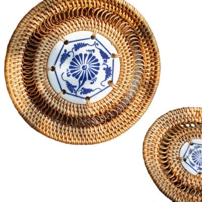 China Sustainable Anti-Slip Washable Natural Rattan Coasters Inlaid with Porcelain Pieces Handmade Rattan Heat-Resistant Coaster for sale