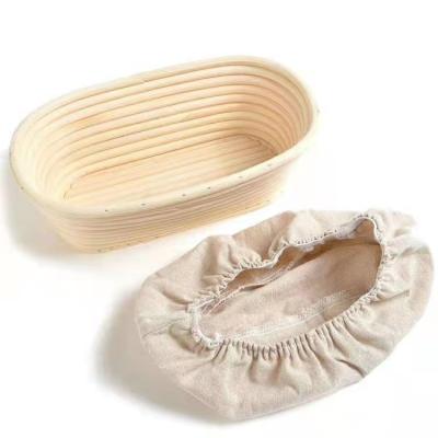 China Sustainable Rattan Woven Oval Bread Baking Basket with Liner Cloth for sale