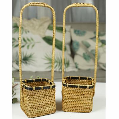 China Sustainable Handwoven Wedding Woven Rattan Decorative Flower Girl Rattan Basket with Long Handles for sale