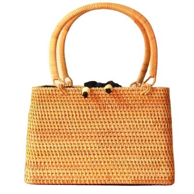 China Sustainable Hand-woven Womens Straw Boho Handbag Bag for Women Summer Beach Rattan Travel Bag with Round Top Handle for sale