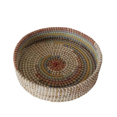 China Sustainable Wholesale sales grass straw braid woven fruit plate Hawaiian style home living room grass fruit plate decoration plate for sale