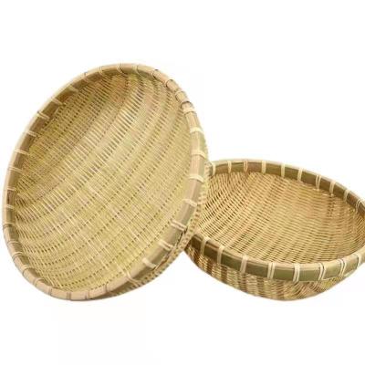 China Sustainable Custom home circular handmade woven kitchen basket durable household decorative washable bamboo basket for sale