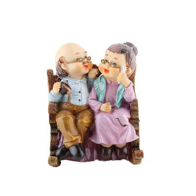 China China bedroom resin rocking chair gift an older couple resin statue ornament wholesale for sale