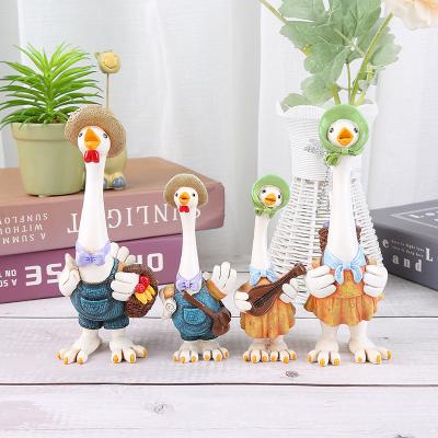 China Europe lovers doll decorations lovers playing decoration guitar swan resin cute and warm crafts for sale