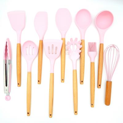 China Sustainable 12 Piece Pink Cookware Set Kitchenware Silicone Kitchenware Set Solid Wood Solid Wood Handle for sale