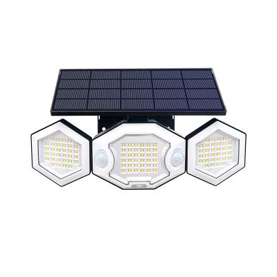 China Garden Solar Outdoor Lights100 LED IP65 Waterproof Motion  Outdoor Lights 3Heads Solar Flood Wall Lights for Outside Garden Patio Yard for sale