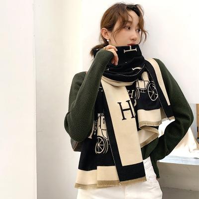 China 2022 hot selling fashion soft smooth women's warm feeling scarves with brand cheap female scarf winter logo cashmere ethnic scarves for sale