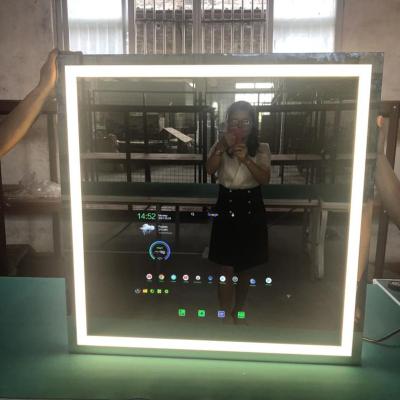 China Illuminated Magic Smart Bathroom Wall Mirror TV in Mirror Android System With Led Light Works With Google Home Alexa Tuya App for sale