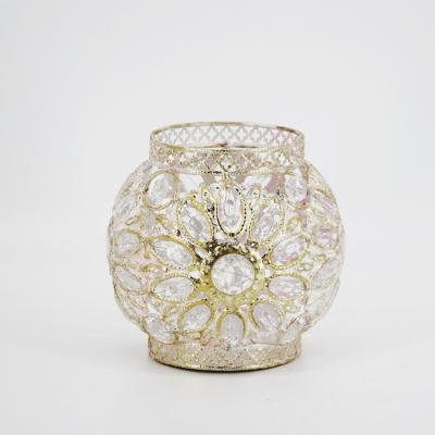 China ECO-frendly European style round shaped candle holder with clear beads decor. metal lantern for sale