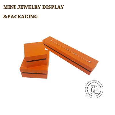 China Fashionable+Cute Gift Box Couples Orange Paper Wedding Ring And Pendant Jewelry Box Sets for sale