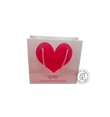 China Custom Wicked Number Heart Recyclable Romantic Economical Paper Favor Bags With Handle For Wedding Jewelry Bag for sale