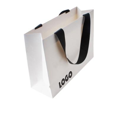 China Recyclable Eco Friendly Custom Printed To Foil Gift Shopping Paper Bag With Logo Print for sale