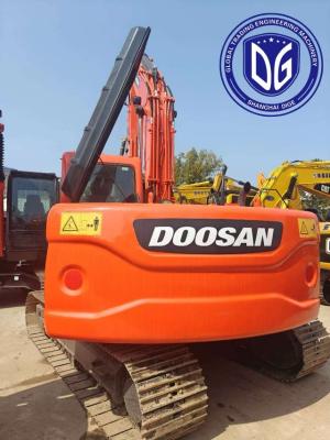 China Excavadora Doosan DX140 potente y duradera para sus proyectos de construcción en venta