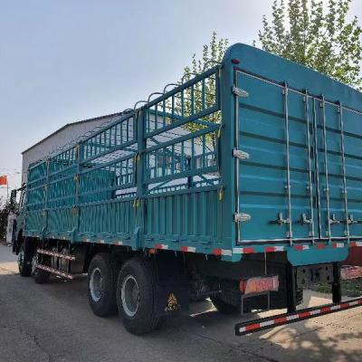 China Low price 10 wheels 6*4 7600x2300x(600+1200)mm howo cargo truck fence cargo truck 103500x2550x3450mm for sale