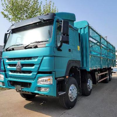 China Sinotruk HOWO 8X4 heavy Truck Fence Cargo Truck for Animal Livestock Transport 103500x2550x3450mm for sale