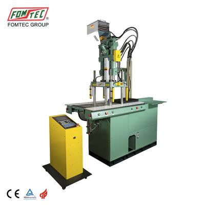 China VERTICAL Semi-automatic vertical plastic injection molding machine shoulder tube brand FOMTEC plastic injection machine for sale