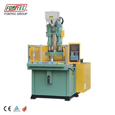 China VERTICAL 60 TON Rotary Table Plastic Injection Molding Machine Pot Making Machine for sale