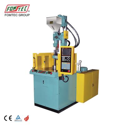 China VERTICAL 25 Ton Sliding Tabletop Vertical Injection Molding Machine Price Plastic Pot Making Machine for sale