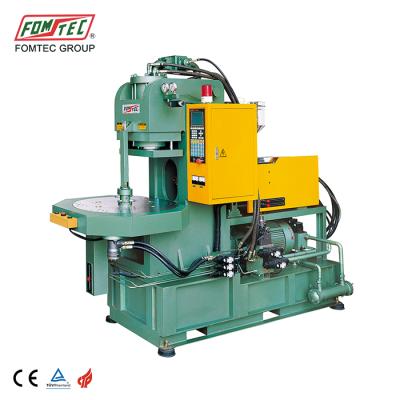 China FOMTEC 750 kN VERTICAL Rotary Table Injection Molding Machine Mini Plastic Injection Machine Toys Making Machine Automatic for sale