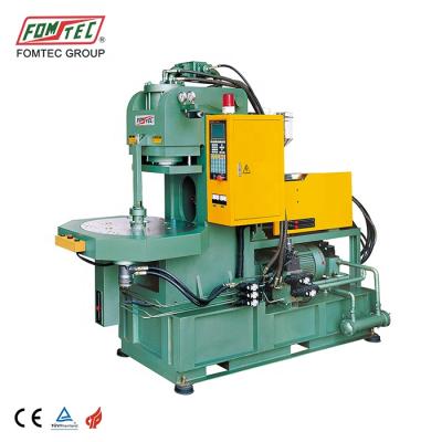 China TON Vertical 75 Angle Type Injection Molding Machinery for sale