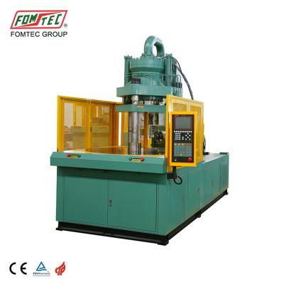 China FOMTEC 1500 KN VERTICAL Rotary Table Injection Molding Machine Two Stations Car Parts Making Machine for sale