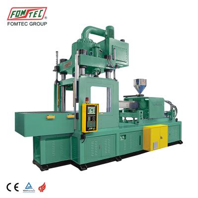 China 210 TON VERTICAL HORIZONTAL INJECTION VERTICAL Clamping Machine With Two Double Sliding Table for sale