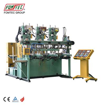 China VERTICAL 1800 kN multiple vertical sliding table shuttle table color injection molding machine CE certified rvo motor injection mold for sale