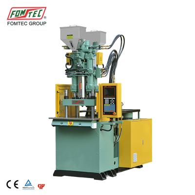 China FOMTEC 60ton VERTICAL toothbrush injection molding machine two color desktop injection molding machine plastic making machine 250mm for sale