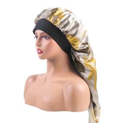 China Sleep hoods with elastic band 2022 new women's double layer wig cap along with elastic band sash black satin silk wig cap for women for sale