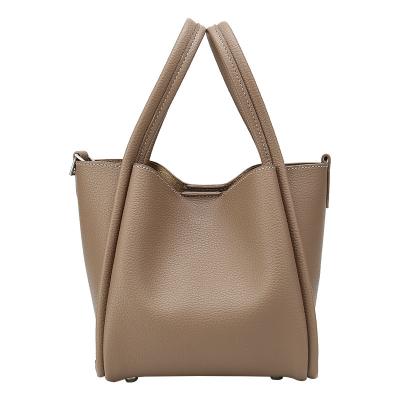 China Fashion PU Leather Casual Shoulder Bag Women 2021 New Solid Color Designer Mini Handbags For Women for sale