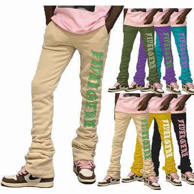 China Custom Logo Graphic Staight Jogging Heavyweight Anti-wrinkle Mens Unisex Cotton Heavy Joggers With Pockets Stacked Sweatpants Men for sale