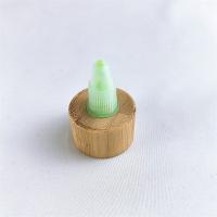 中国 24/410 28/410 Disc Top Caps with Bamboo Collar for Lotion and Cosmetics 販売のため