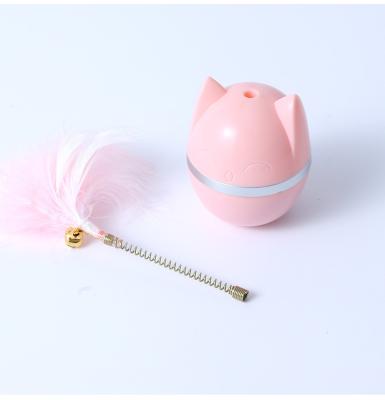 China Viable Wholesale Educational Toy Funny Leaking Food Cat Tumbler Ball With Bell Feather Educational Temptress Toys Pet Supplies for sale