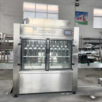 China Food Glass Bottle Vodka Making Machine Wine Filling Machine Automatic Small Scale for sale