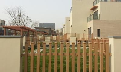 China Sandalwood WPC Fence panels and Plastic Wood Wall Grid for Countryard for sale