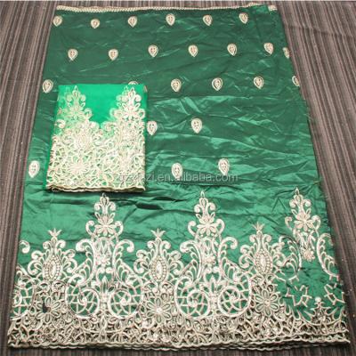 China Viable Indian Raw Silk Heavy Embroidery Georges Wrappers With Net Nigerian Blouse for sale