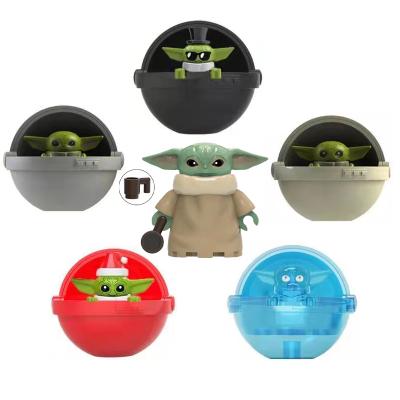 China Transparent Building Toy New star baby space capsule baby yoda struggles mini Mandalorian figures building blocks gift toys for kids for sale