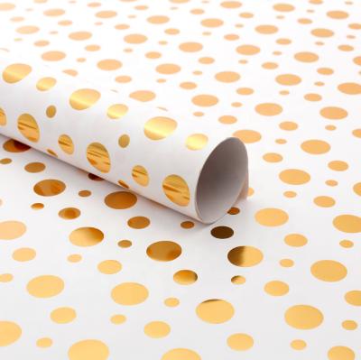 China Customized High Quality Moisture Proof Gift Wrapping Hot Stamping Paper Roll for sale