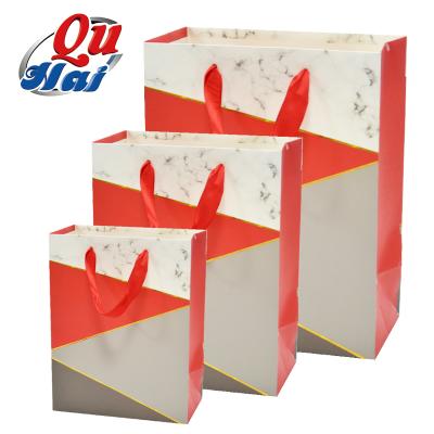 China Luxury Marble Shopping Foil Recycled Logo Print From Boutique Giftbags Paper Bag China Manufacture Materials Custom Red Gift Wrapping Bag for sale