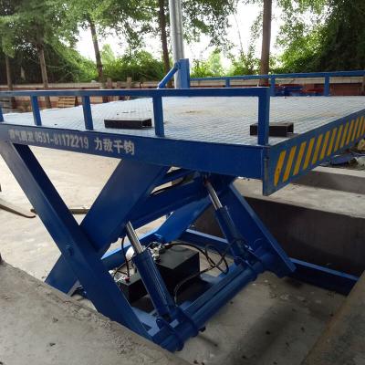 China 3tons car lift hydraulic scissor car elevator cargo lift freight elevator goods lift à venda