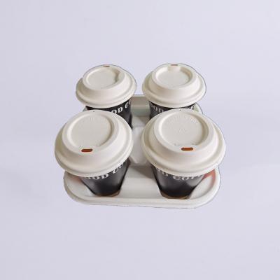 China Dspisable Disposable 100% Biodegradable Sugar Cane Bagasse Cup Holder With 4 Holes Packing for sale