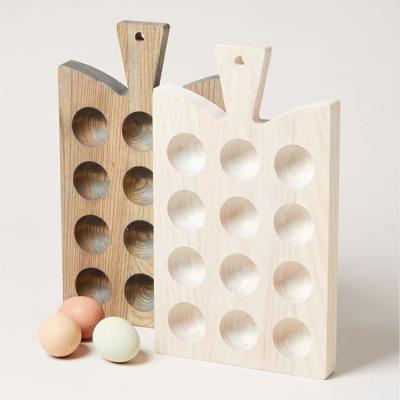 China Kitchen Tableware 12 Holes Rabbit Egg Cup Viable Wooden Kinder Plater Solid Wood Egg Holder With Handle for sale