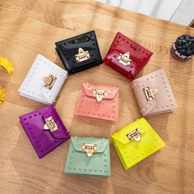 China 2021 Hot Sale Fashion Silicone Casual Cute Chain Ladies Small Bag Mini Kids Jelly Purse Women Handbag Rivet Waterproof Candy Jelly Shoulder Bag for sale