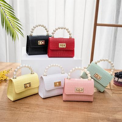 China 2021 Hot Sale Kids Casual Fashion Small Mini Freeze Waterproof Bags Women Handbags Ladies Girls Ladies Candy PVC Chain Purse Silicone Cute Bags for sale