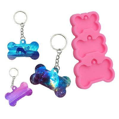 China Viable Shiny Dog Bone Shape Silicone Mold For Key Chain Pendant Molds Suitable For Clay DIY Jewelry Making Epoxy Resin Mold for sale