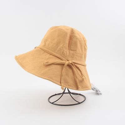 China Customized High Quality Soft Logo Cotton Bucket Hat Solid Color Bow Fisherman Hat for sale