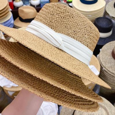 China Flat Surface Unisex Straw Hat High Quality Luxury Panama Straw Hats For Women Summer Wide Brim Striped Elegant Women's Beach Hats for sale